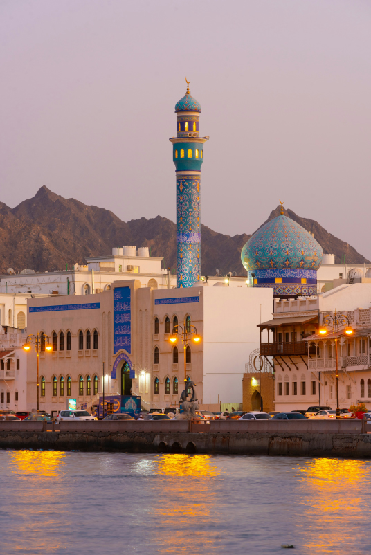 Muscat waterfront at dusk